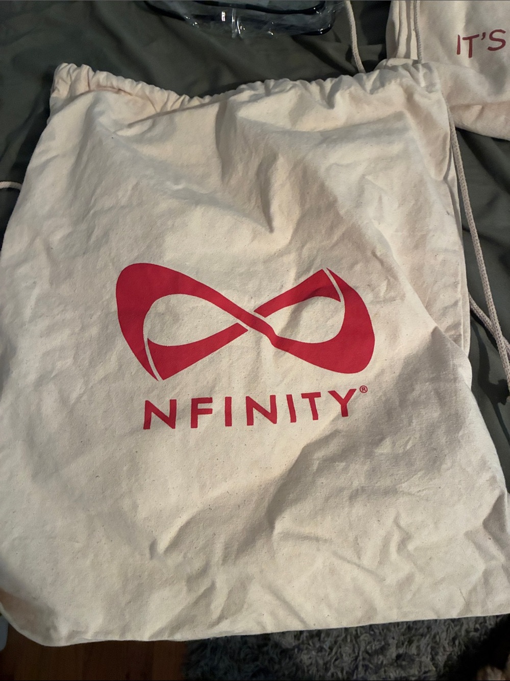 NFINITY Cream Canvas Drawstring Tote with Red Logo